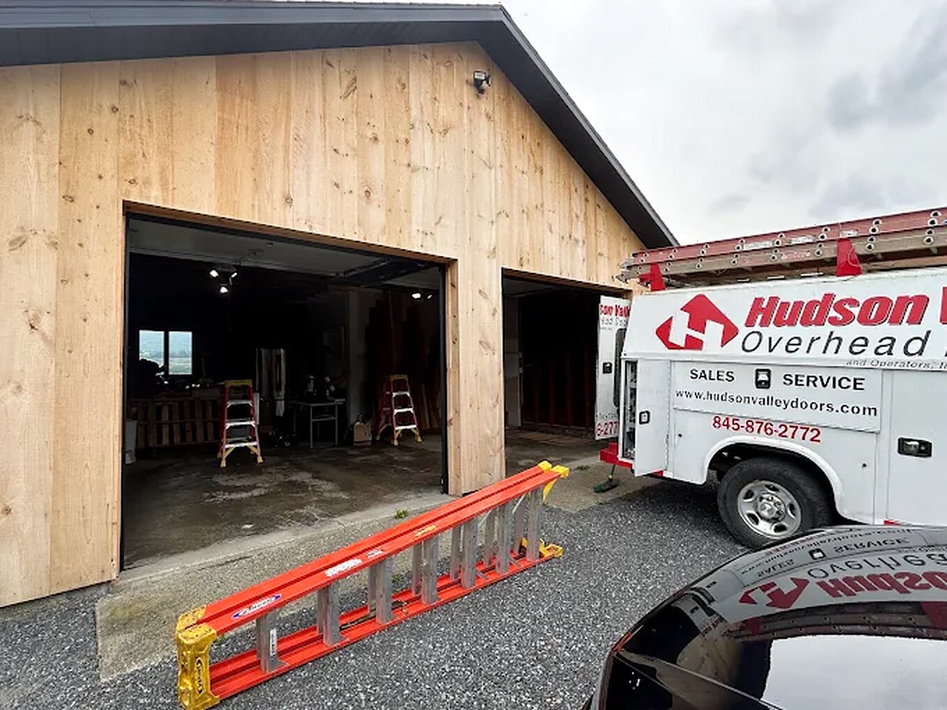 Hudson Valley Overhead Doors shop in Rhinebeck, NY with company service truck